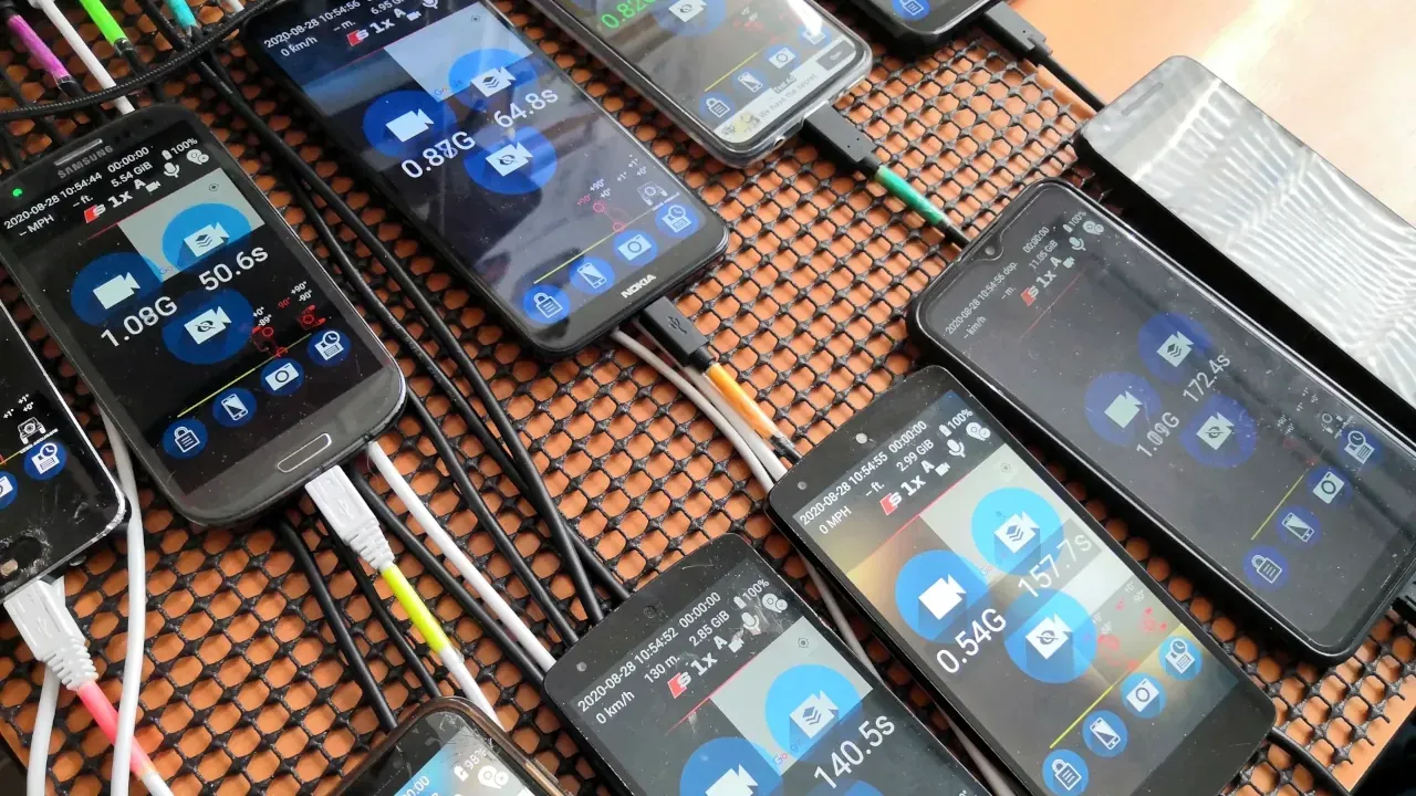 Several Android phones running automated DashCam Travel tests